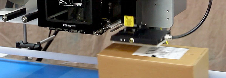 Model 5300 tamp-blow label printer applicator