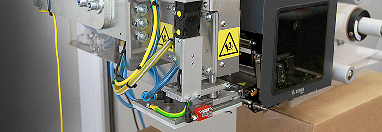 Model 4050 tamp-blow label printer applicator